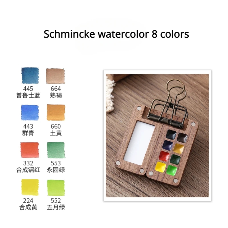 Small watercolor brush and tiny sketchbook included in the Schmincke watercolor set