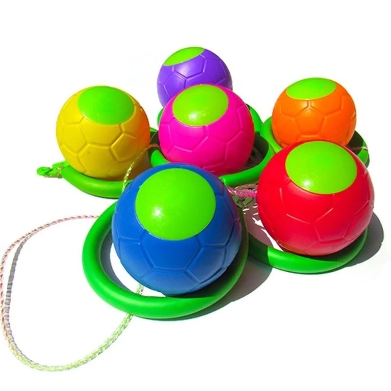 Top view of a bright play ball with a springy base