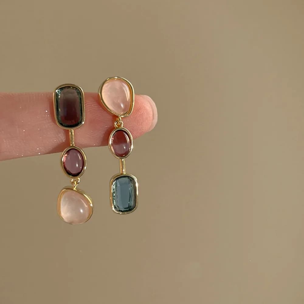 Stylish women's needle earrings with a vintage design and multicolored stones