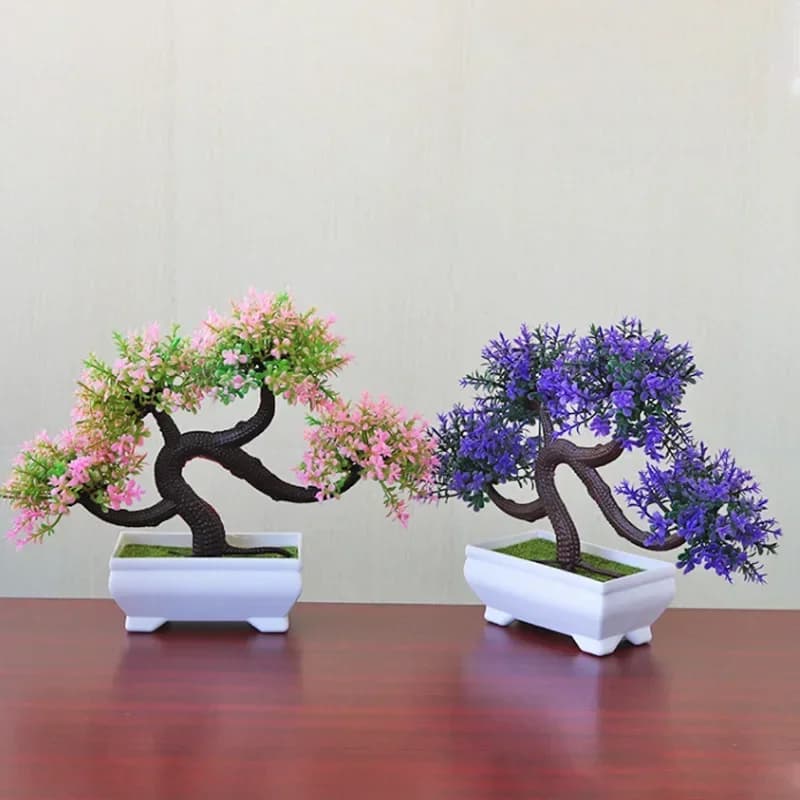 Decorative artificial bonsai plant in a ceramic pot