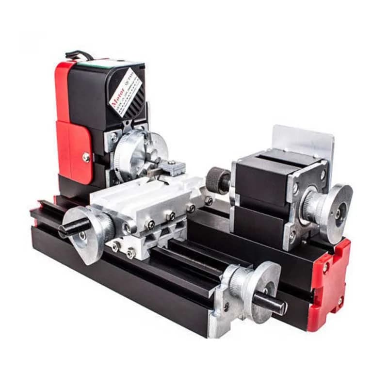 Image of a mini lathe in operation on a dark background