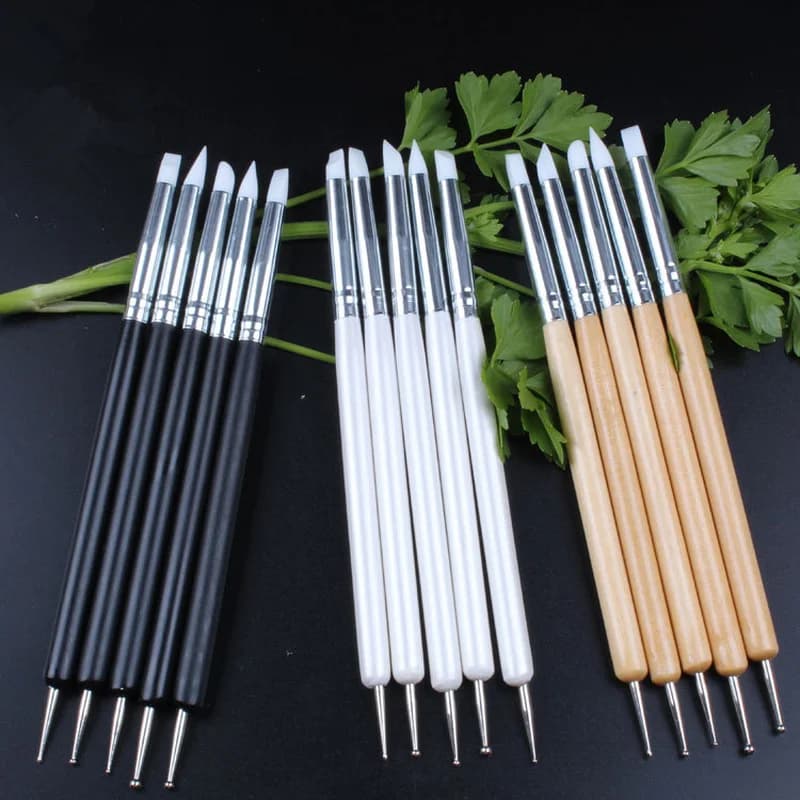 Image of a set of five sculpting tools with wooden handles and flexible silicone tips