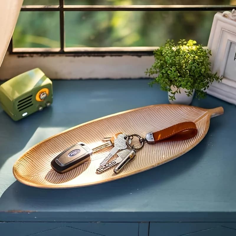 Elegant wooden tray with a gold decorative element